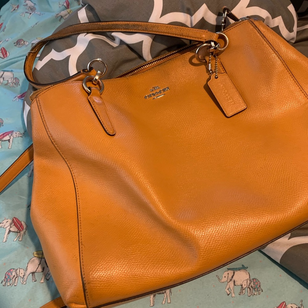Vibrant mustard coach purse